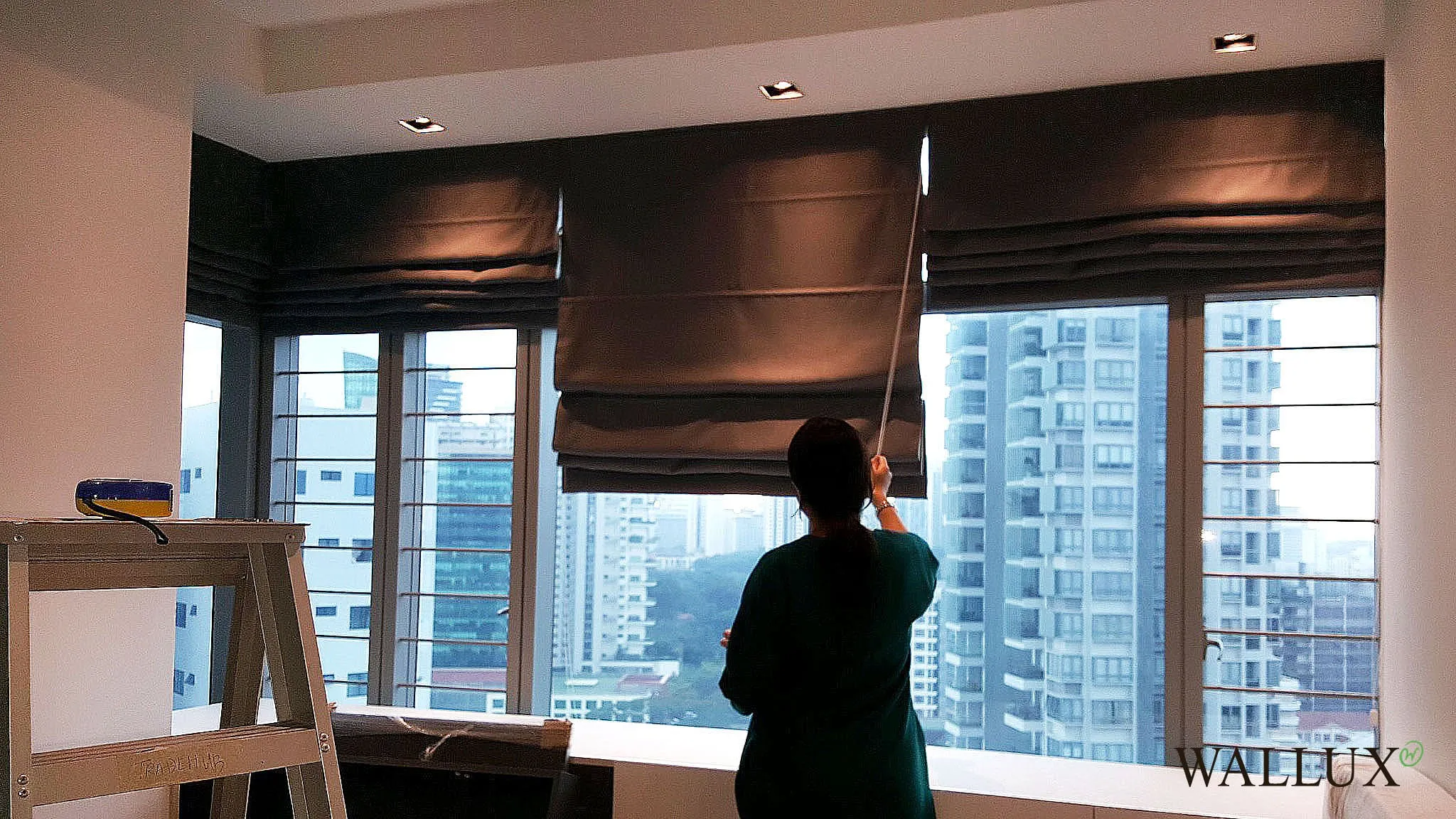 bronze roman blinds condo installation