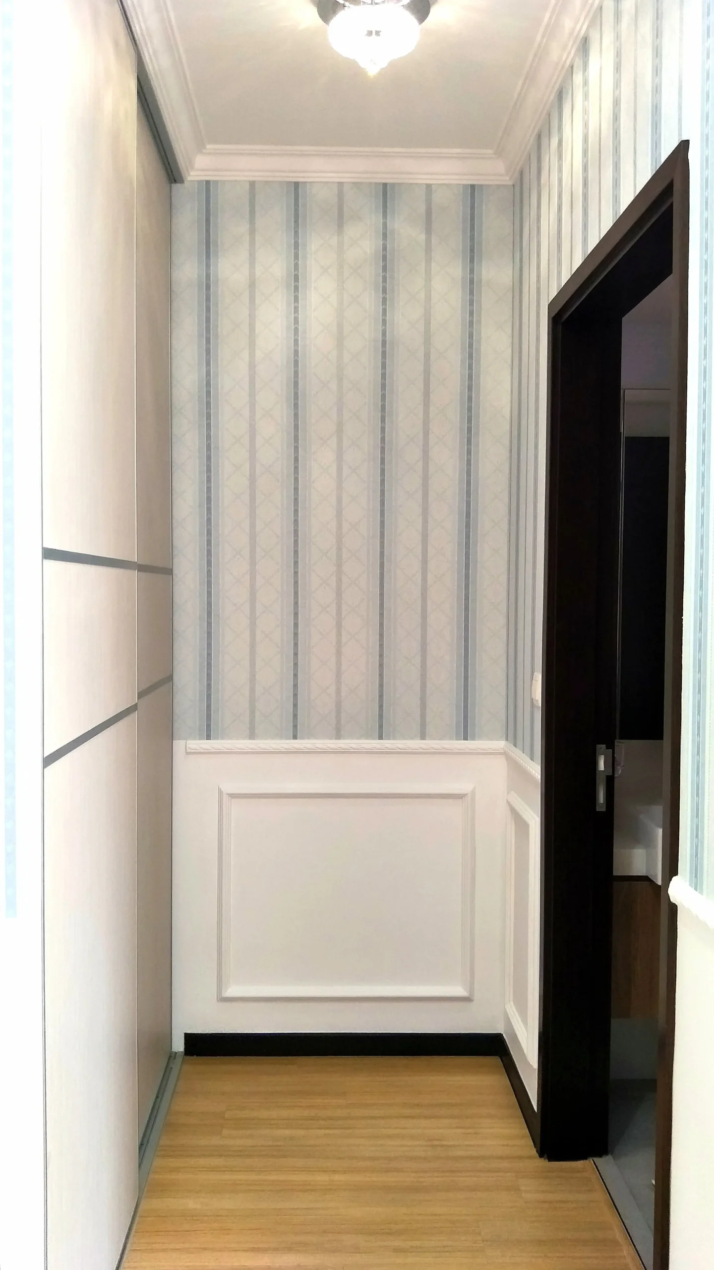 striped pastel wallpaper hallway